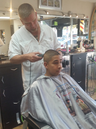 Erick giving a haircut